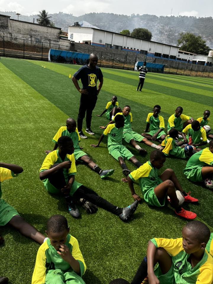 Foundation coach seated on the bench