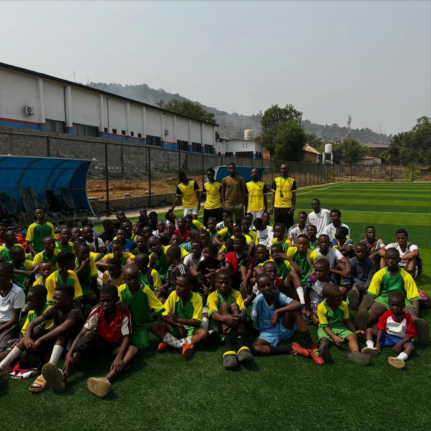 Large group of youth players on the football pitch